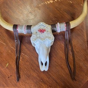 Hand decorated Bull Skull with authentic Louis Vuitton and real leather fringe